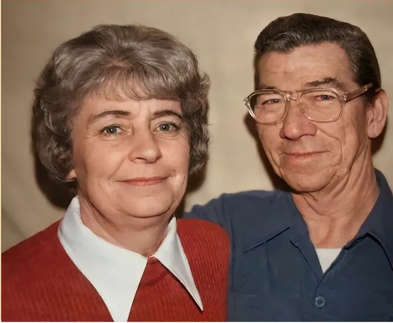 The same 1950s-1970s photograph after hand restoration by MemoryCherish, creases and tears repaired and detail recovered