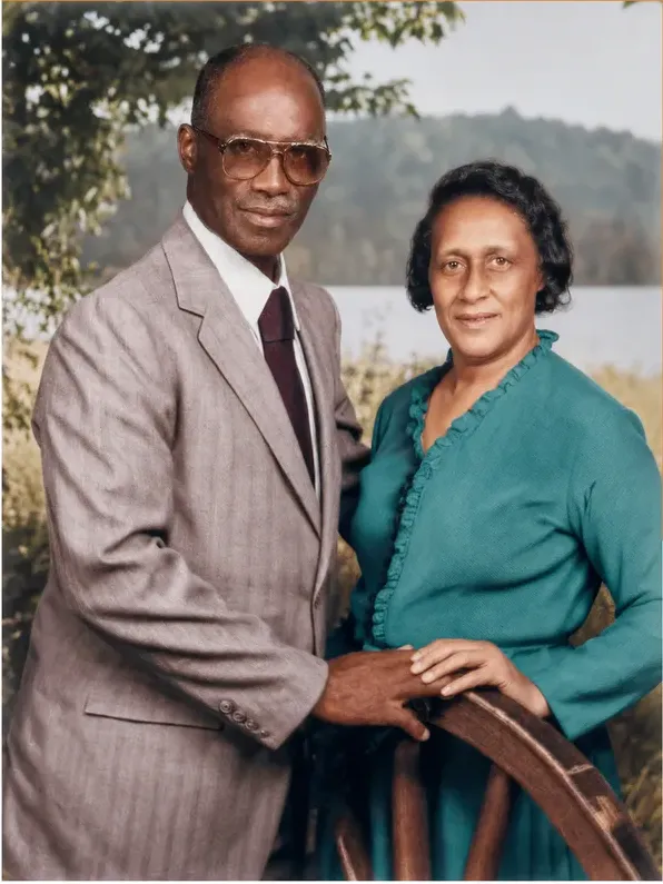The same 1980s-plus photo restored by hand at MemoryCherish, discoloration corrected and clarity brought back