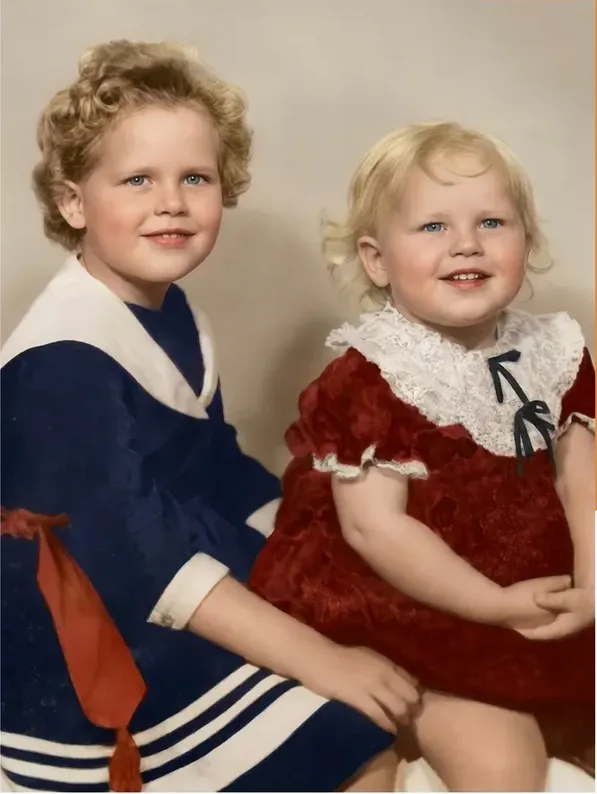 The same pre-1950 photo restored by hand at MemoryCherish, water damage corrected and clarity brought back