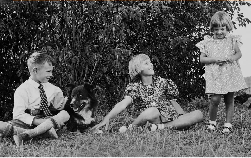 The same pre-1950 photo restored by hand at MemoryCherish, stains and marks corrected and clarity brought back