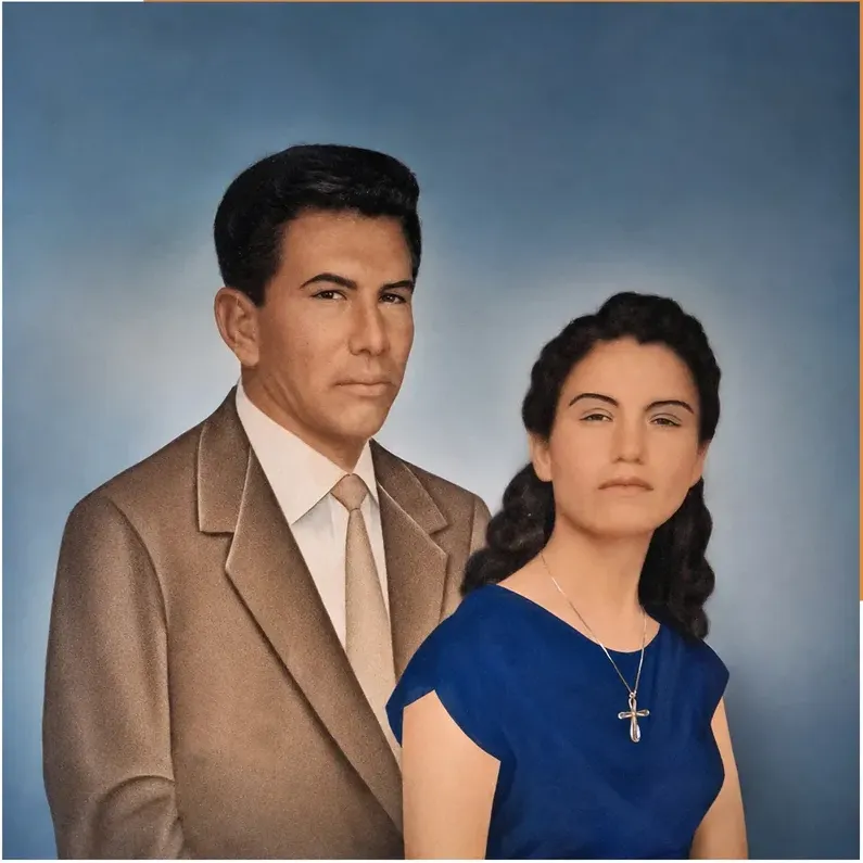 The same 1950s-1970s photo restored by hand at MemoryCherish, water damage corrected and clarity brought back