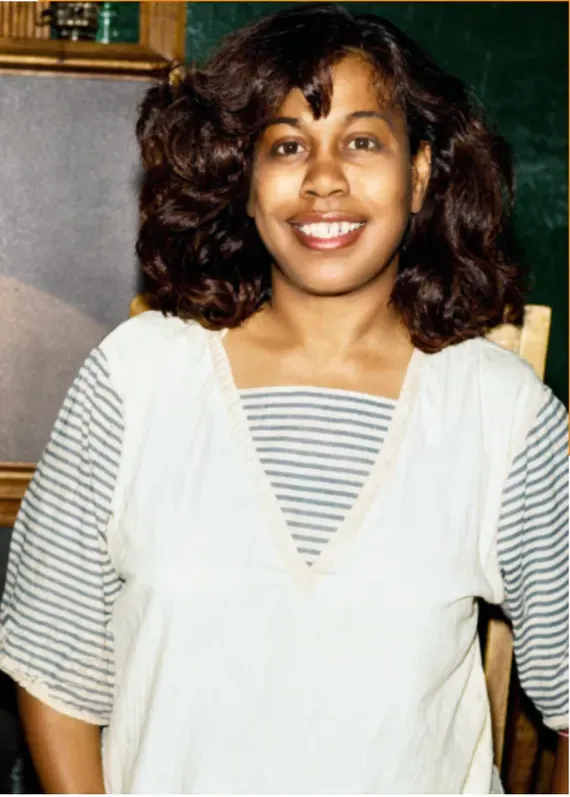 The same 1980s-plus photograph after hand restoration by MemoryCherish, scratches repaired and detail recovered