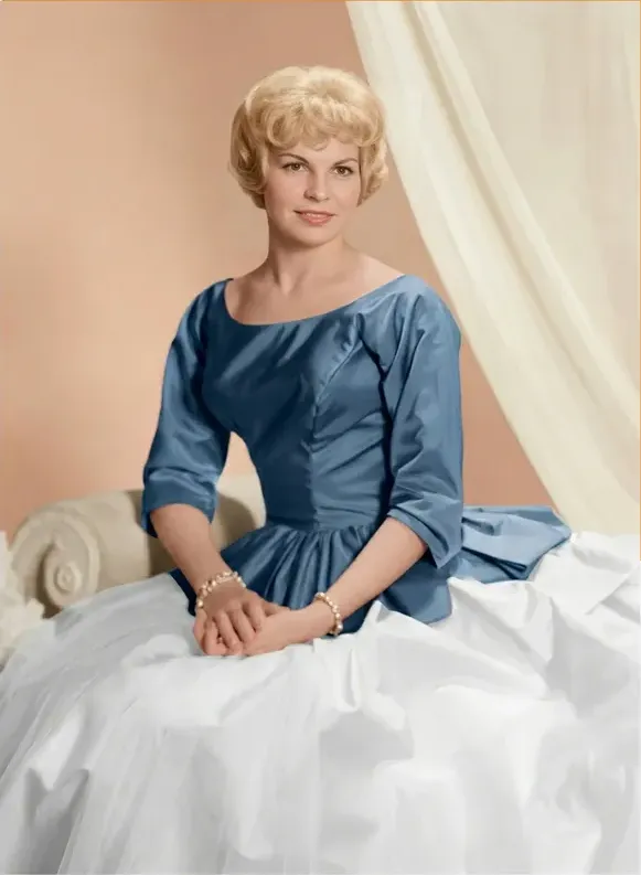 The same 1950s-1970s photograph after hand restoration by MemoryCherish, stains and marks repaired and detail recovered