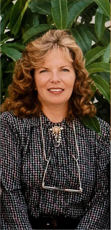 The same 1980s-plus photo restored by hand at MemoryCherish, discoloration corrected and clarity brought back