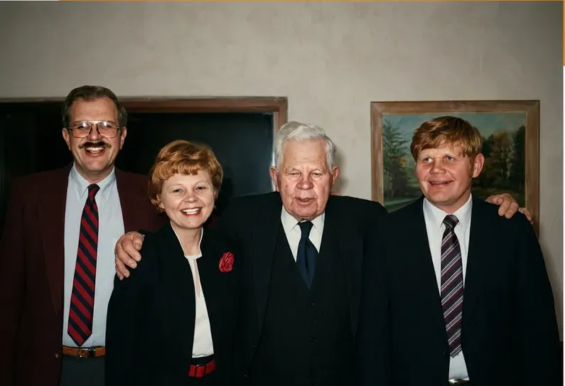 The same 1980s-plus photograph after hand restoration by MemoryCherish, discoloration repaired and detail recovered