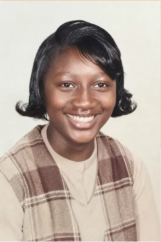 The same 1950s-1970s photo restored by hand at MemoryCherish, creases and tears corrected and clarity brought back
