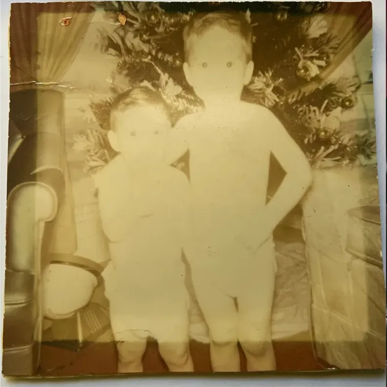 Original 1950s-1970s photograph showing creases and tears, before photo restoration by MemoryCherish