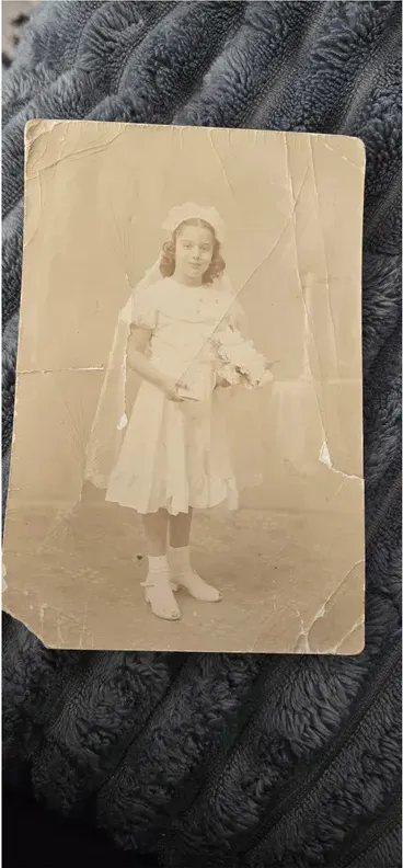 Black-and-white pre-1950 photograph before hand colorization by MemoryCherish artists