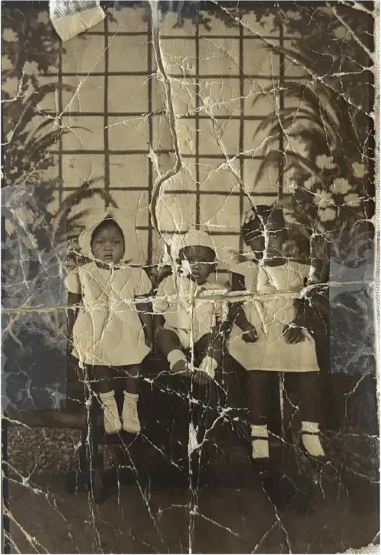 Original 1950s-1970s photograph showing water damage, before photo restoration by MemoryCherish