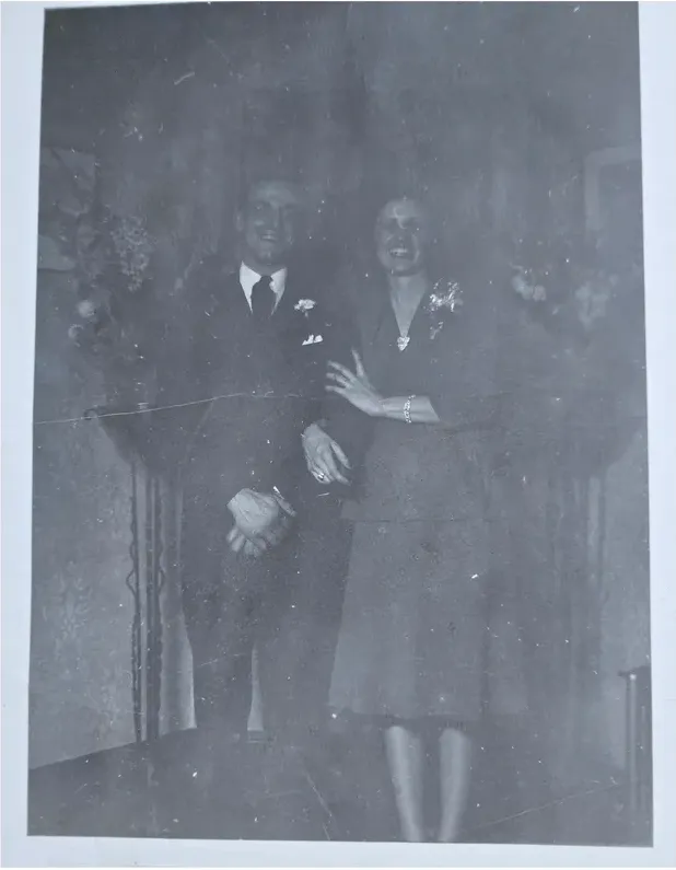 Scratches on a 1950s-1970s photograph, before hand restoration by MemoryCherish artists