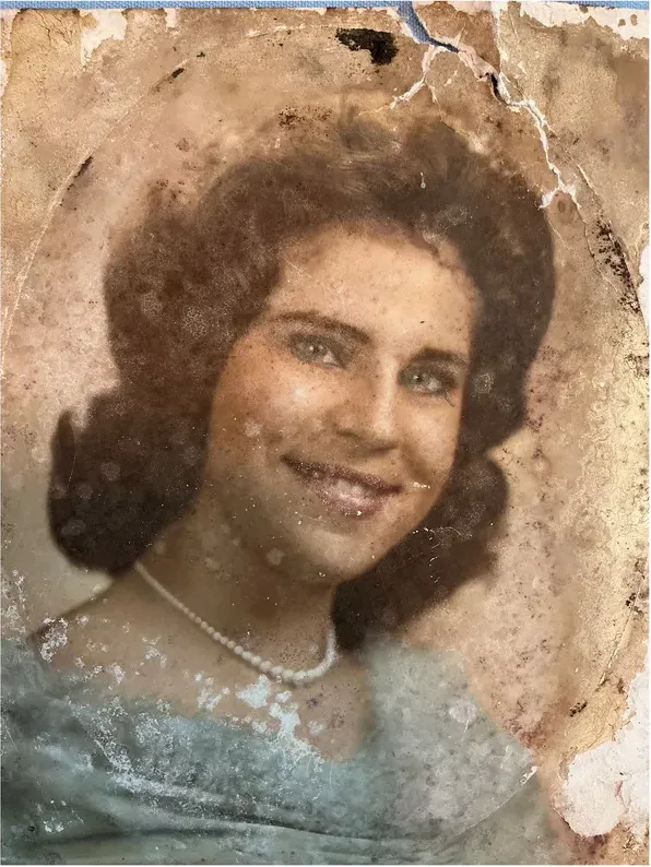 Original 1950s-1970s photograph showing water damage, before photo restoration by MemoryCherish