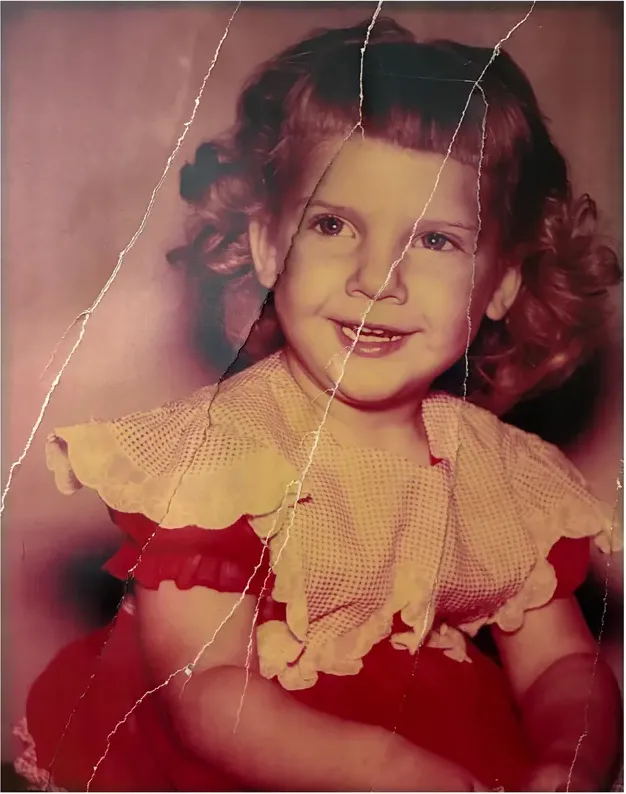 Creases and tears on a 1950s-1970s photograph, before hand restoration by MemoryCherish artists