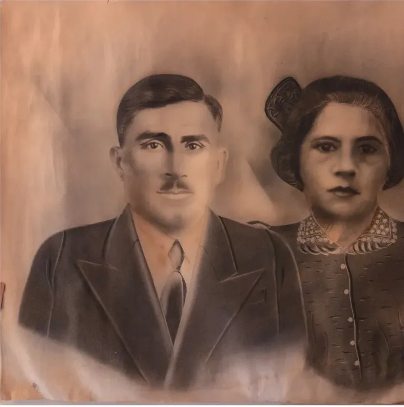 Creases and tears on a pre-1950 photograph, before hand restoration by MemoryCherish artists