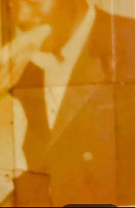 Creases and tears on a photograph, before hand restoration by MemoryCherish artists