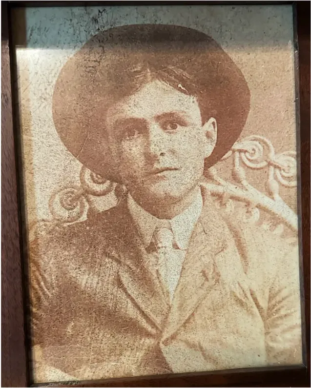 Scratches on a pre-1950 photograph, before hand restoration by MemoryCherish artists