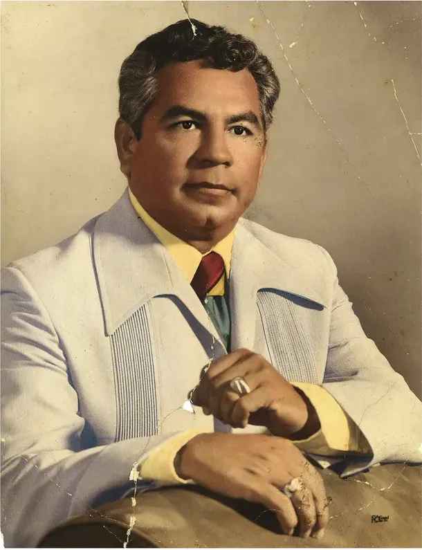 Creases and tears on a 1950s-1970s photograph, before hand restoration by MemoryCherish artists