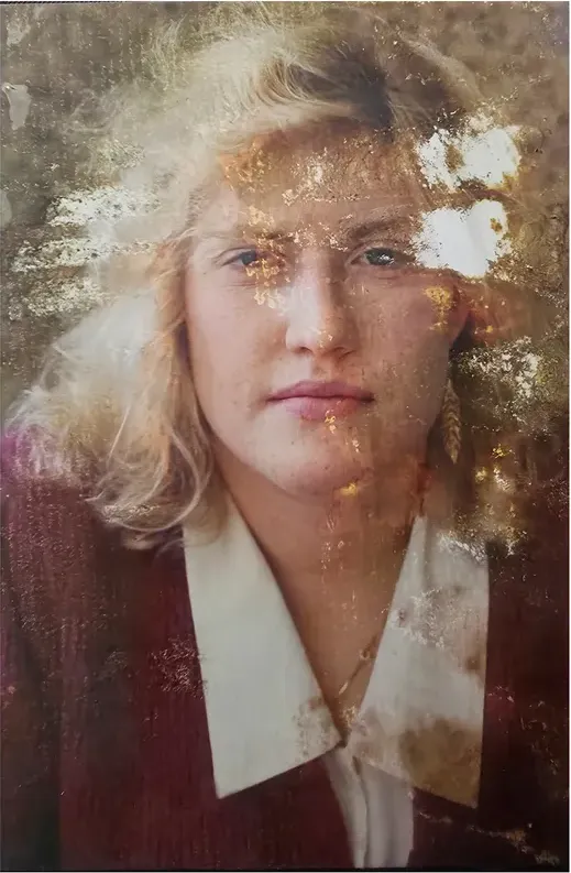 Water damage on a 1980s-plus photograph, before hand restoration by MemoryCherish artists