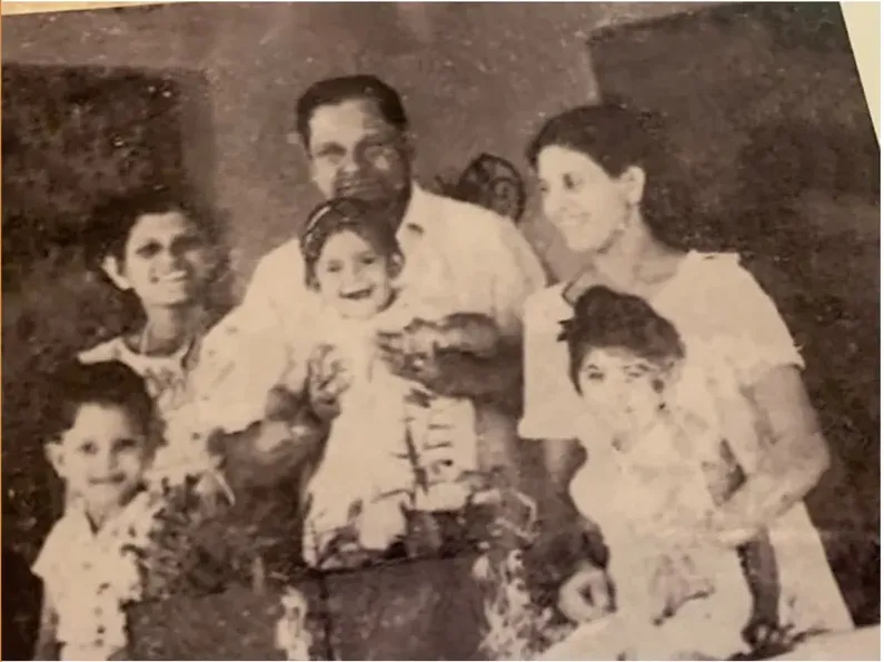 Original 1950s-1970s photograph showing discoloration, before photo restoration by MemoryCherish