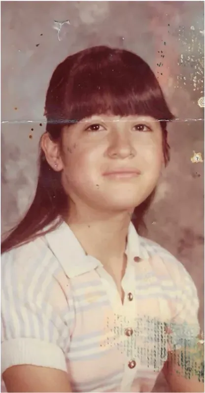 Creases and tears on a 1950s-1970s photograph, before hand restoration by MemoryCherish artists
