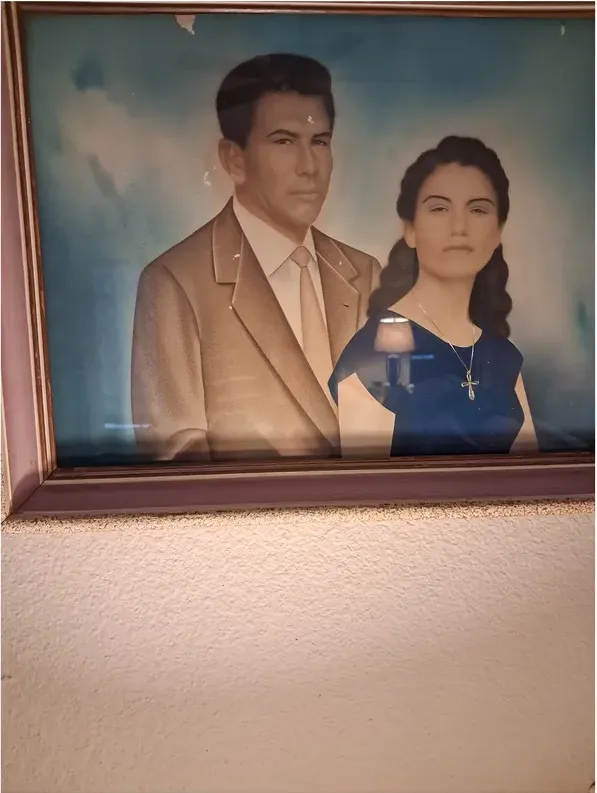Original 1950s-1970s photograph showing water damage, before photo restoration by MemoryCherish