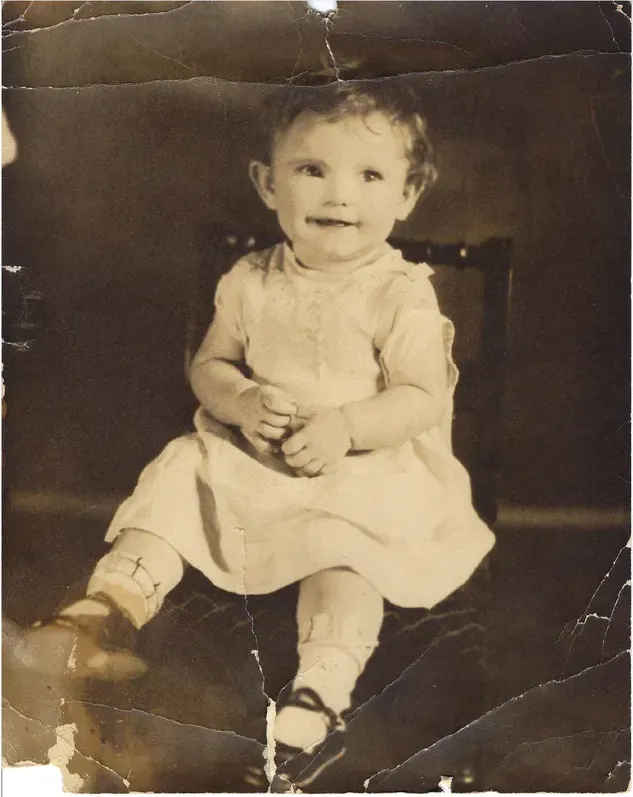 Original pre-1950 photograph showing creases and tears, before photo restoration by MemoryCherish