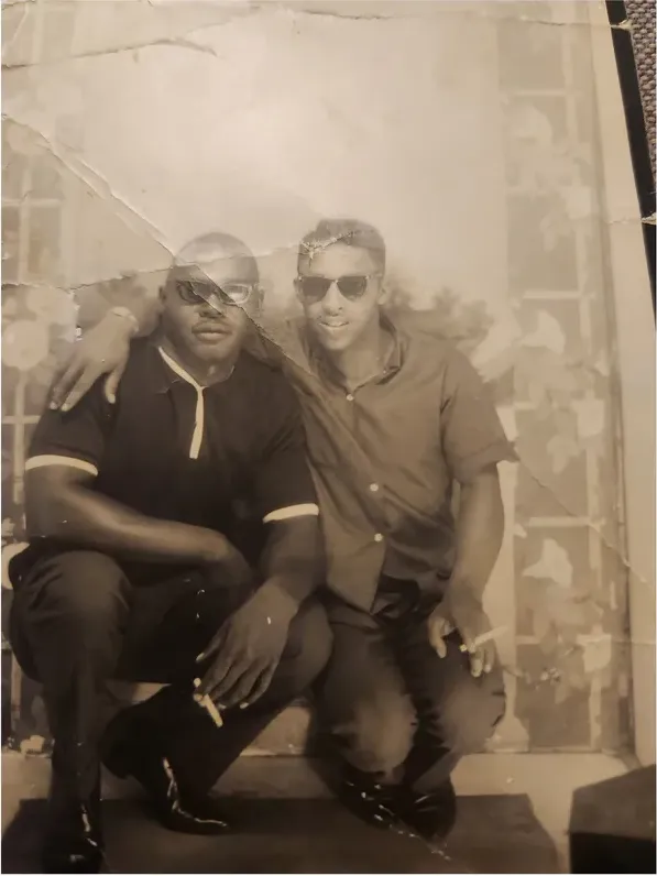 Creases and tears on a 1950s-1970s photograph, before hand restoration by MemoryCherish artists