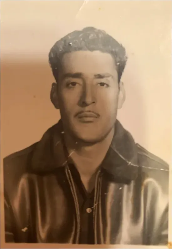 Creases and tears on a 1950s-1970s photograph, before hand restoration by MemoryCherish artists