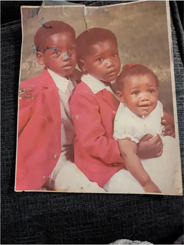 Original 1980s-plus photograph showing creases and tears, before photo restoration by MemoryCherish