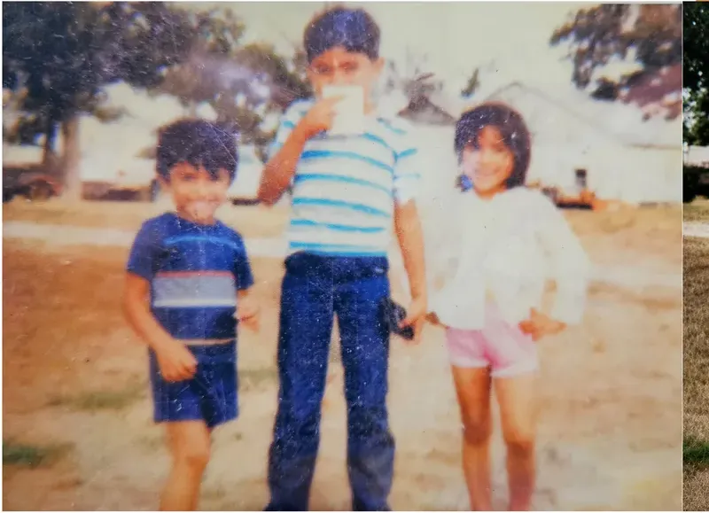 Scratches on a 1980s-plus photograph, before hand restoration by MemoryCherish artists