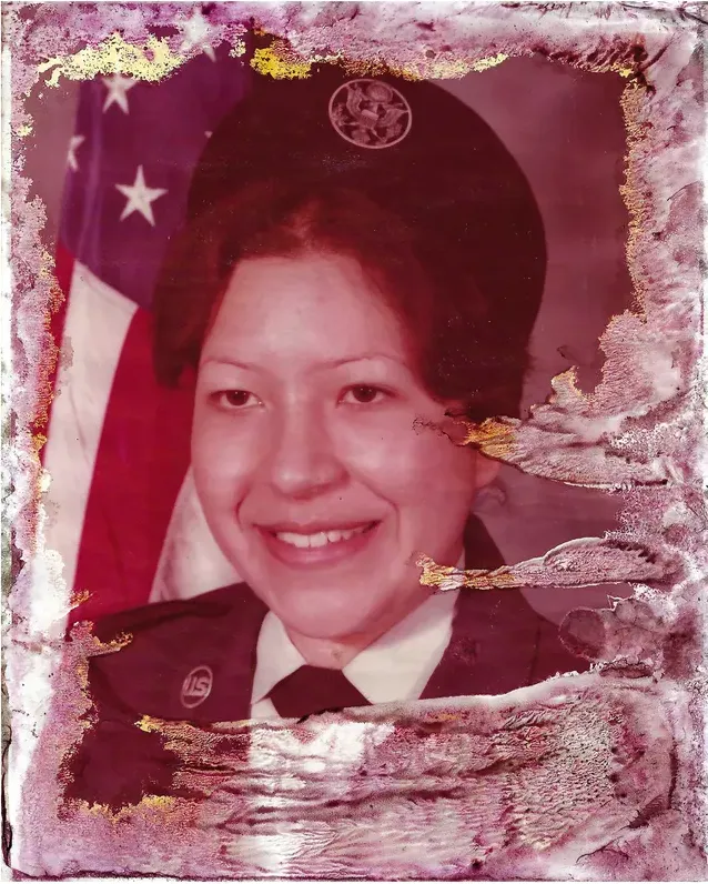 Water damage on a 1950s-1970s photograph, before hand restoration by MemoryCherish artists
