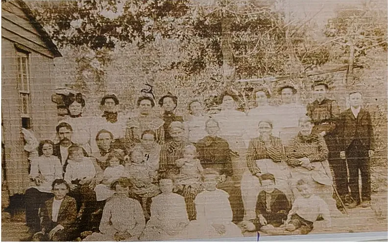 Black-and-white pre-1950 photograph before hand colorization by MemoryCherish artists