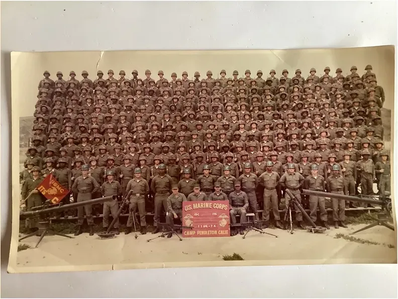 Creases and tears on a 1950s-1970s photograph, before hand restoration by MemoryCherish artists