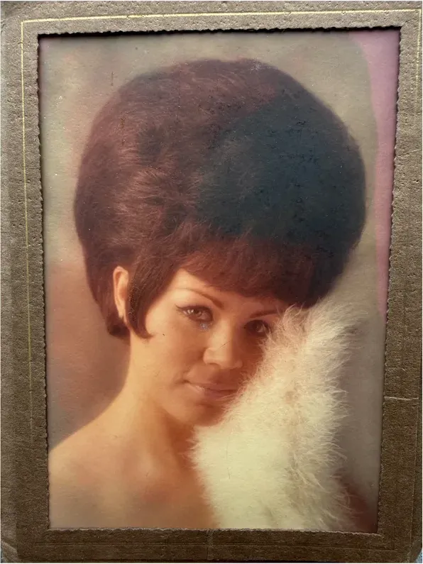 Stains and marks on a 1950s-1970s photograph, before hand restoration by MemoryCherish artists