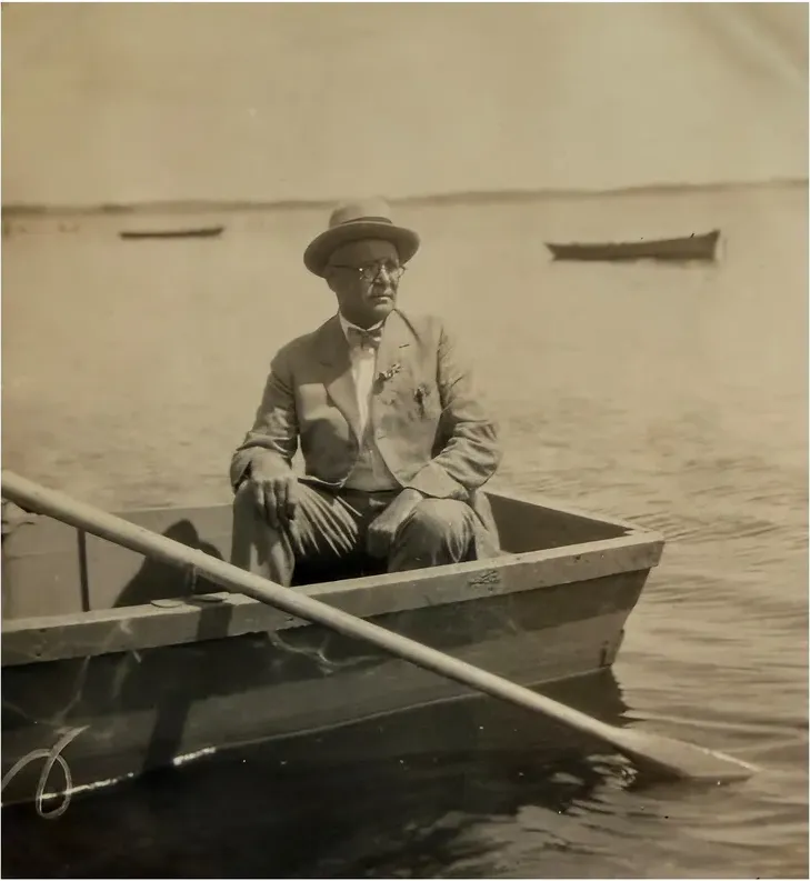 Discoloration on a pre-1950 photograph, before hand restoration by MemoryCherish artists