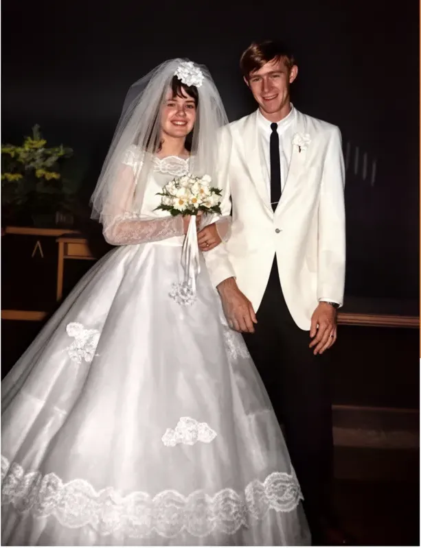 The same 1950s-1970s photograph after hand restoration by MemoryCherish, scratches repaired and detail recovered