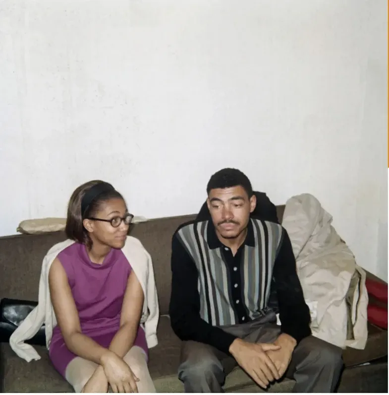 The same 1950s-1970s photo restored by hand at MemoryCherish, stains and marks corrected and clarity brought back