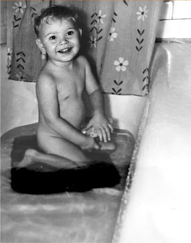 The same 1950s-1970s photo restored by hand at MemoryCherish, creases and tears corrected and clarity brought back