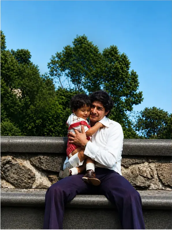 The same 1980s-plus photo restored by hand at MemoryCherish, stains and marks corrected and clarity brought back