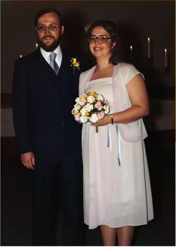 The same 1950s-1970s photo restored by hand at MemoryCherish, discoloration corrected and clarity brought back