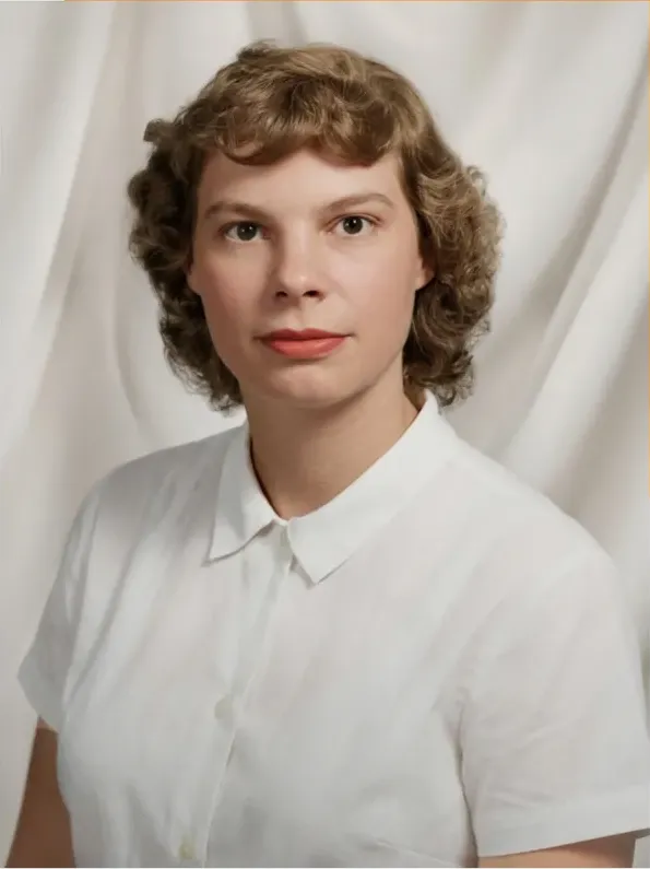 The same 1950s-1970s photo restored by hand at MemoryCherish, stains and marks corrected and clarity brought back