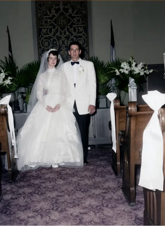 The same 1950s-1970s photo restored by hand at MemoryCherish, creases and tears corrected and clarity brought back
