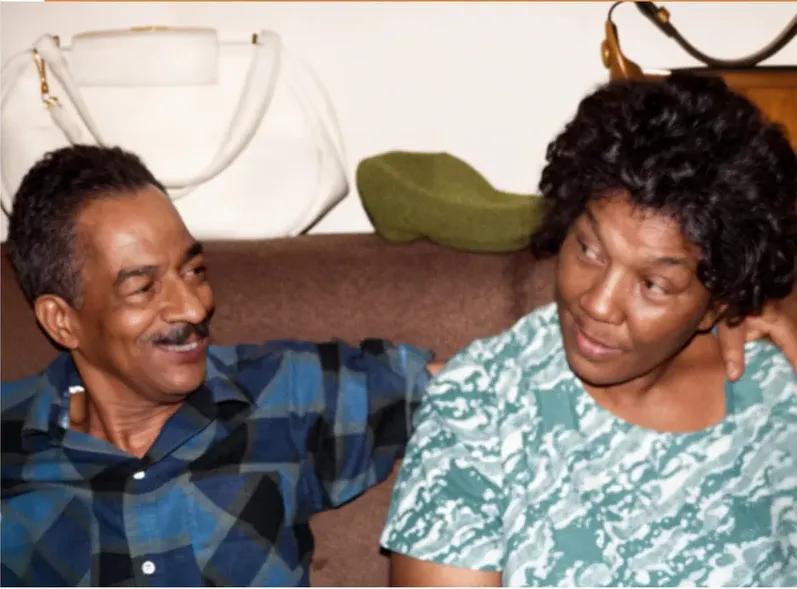 The same 1950s-1970s photograph after hand restoration by MemoryCherish, discoloration repaired and detail recovered