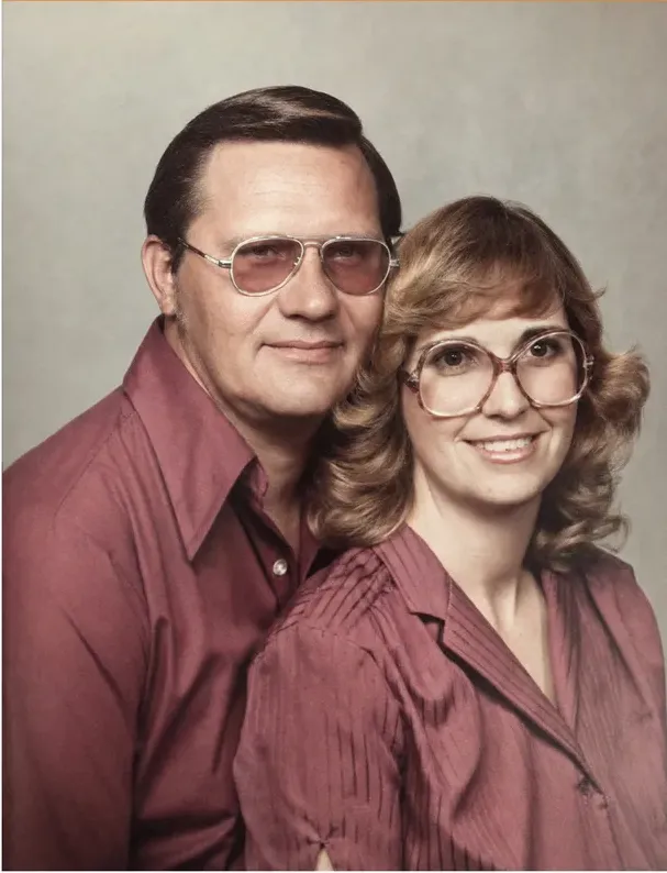 The same 1980s-plus photo restored by hand at MemoryCherish, discoloration corrected and clarity brought back