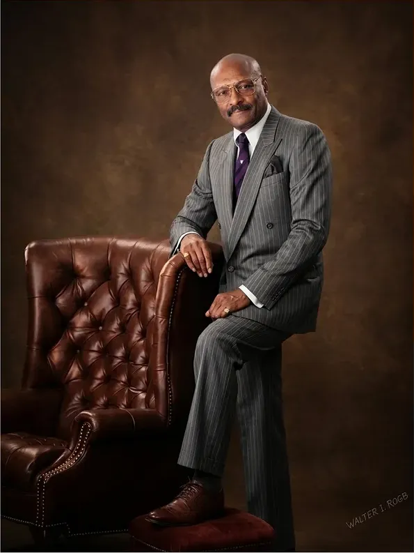 The same 1980s-plus photograph after hand restoration by MemoryCherish, creases and tears repaired and detail recovered