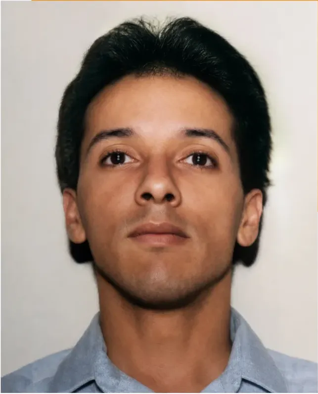 The same 1980s-plus photograph after hand restoration by MemoryCherish, water damage repaired and detail recovered
