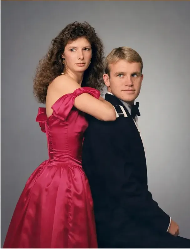 The same 1980s-plus photo restored by hand at MemoryCherish, water damage corrected and clarity brought back