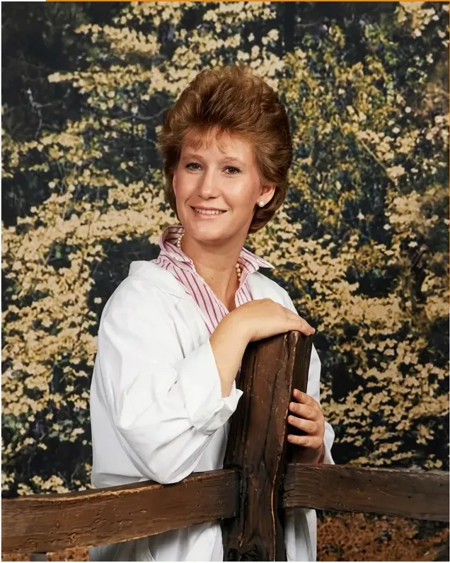 The same 1980s-plus photograph after hand restoration by MemoryCherish, fading repaired and detail recovered