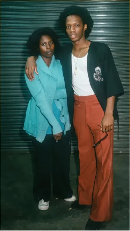 The same 1950s-1970s photo restored by hand at MemoryCherish, water damage corrected and clarity brought back