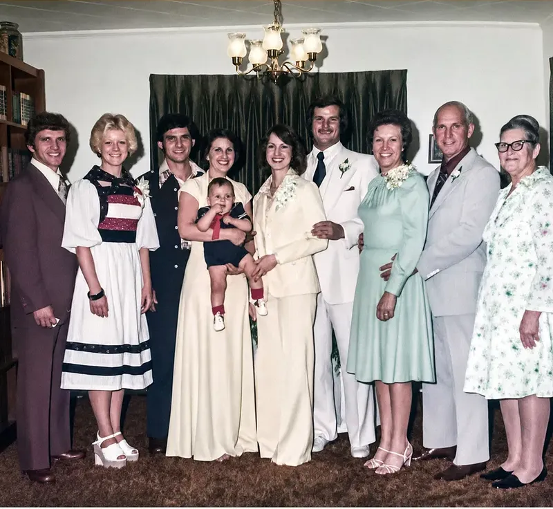 The same 1950s-1970s photo restored by hand at MemoryCherish, discoloration corrected and clarity brought back