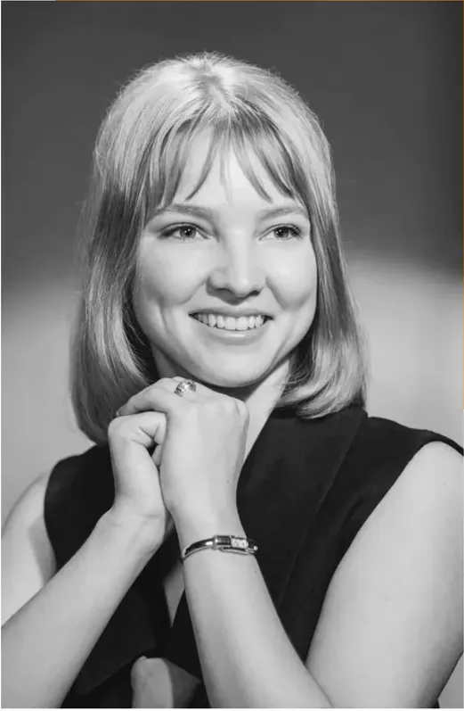 The same 1950s-1970s photo restored by hand at MemoryCherish, stains and marks corrected and clarity brought back